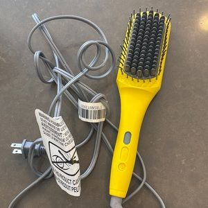 Drybar brush crush - combines the heat of a flat-iron.